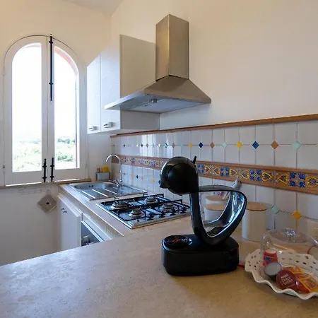 Casa Vacanze Baia Di Guidaloca بيت للعطل *